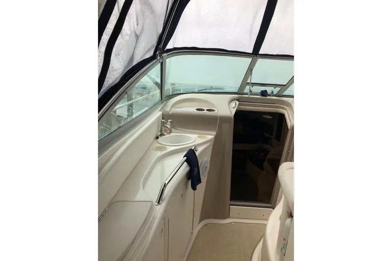 Slide: The Image of Cockpit Walkway with Sink and Storage - 13