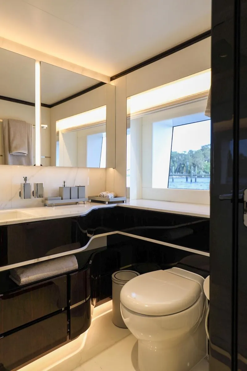 Slide: The Image of Luxurious bathroom in 2025 Majesty 120 yacht with modern fixtures and large window. - 55