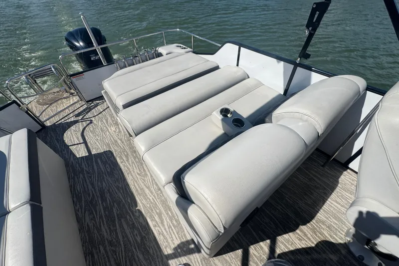 Slide: The Image of 2020 SunCatcher Elite 326 DLX SS boat with luxurious seating on a sunny day. - 12