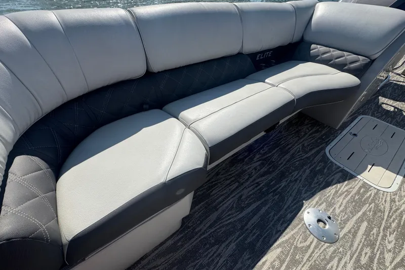 Slide: The Image of Luxurious seating on 2020 SunCatcher Elite 326 DLX SS pontoon boat, featuring elegant upholstery. - 17