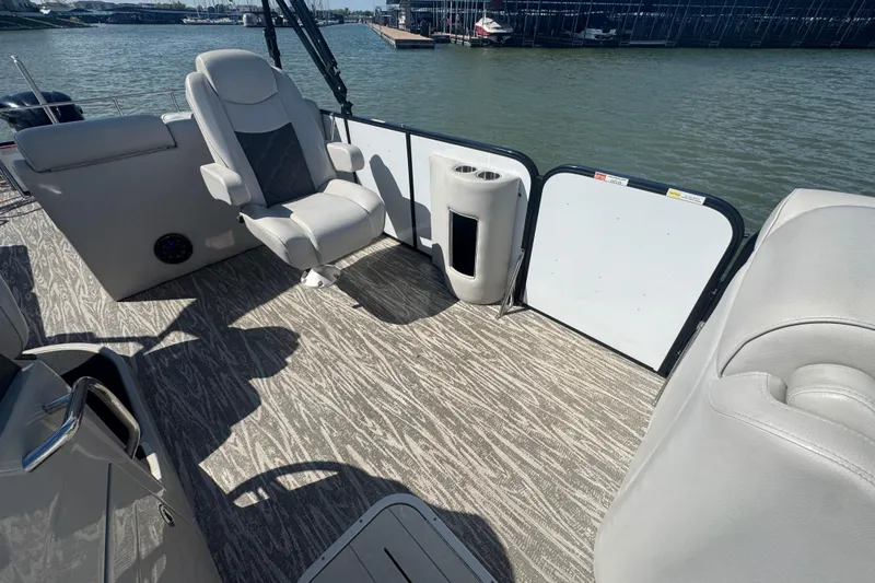 Slide: The Image of 2020 SunCatcher Elite 326 DLX SS boat interior with seating and lake view. - 19