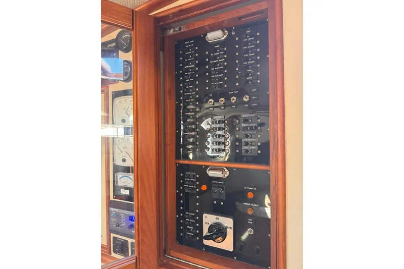 Slide: The Image of Electrical control panel on a 1999 Grand Banks 38 Eastbay EX yacht. - 22