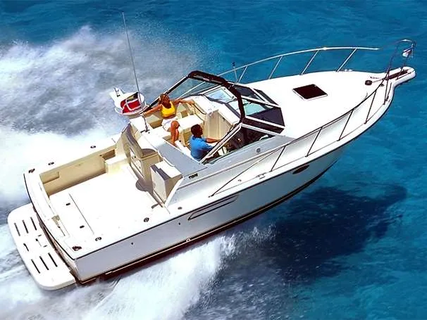 The Image of 2001 Tiara Yachts 2900 Open boat on calm water with American flag. - 0
