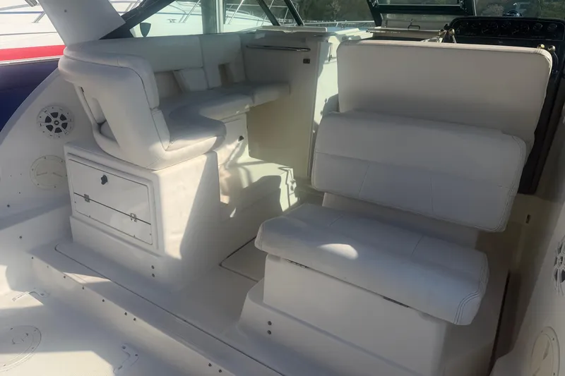 Slide: The Image of 2001 Tiara Yachts 2900 Open interior with white seating and dashboard. - 15