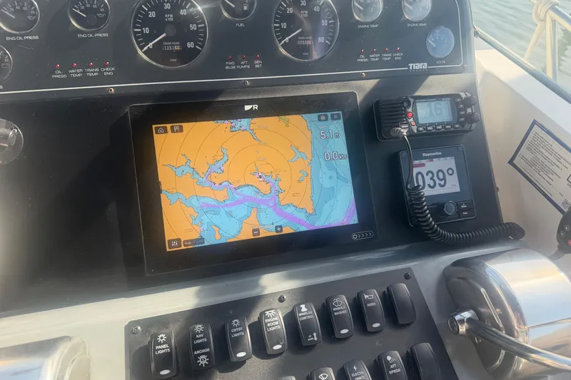Slide: The Image of Dashboard of a 2001 Tiara Yachts 2900 Open with navigation equipment. - 20