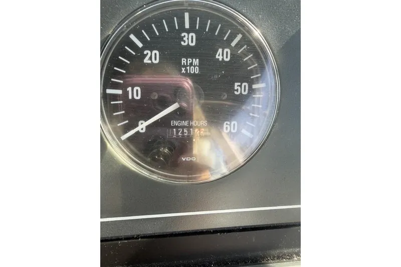 Slide: The Image of Close-up of a 2001 Tiara Yachts 2900 Open RPM gauge showing engine hours. - 21