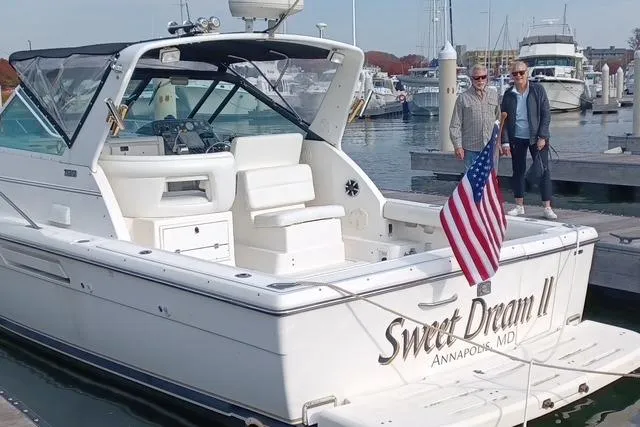 Slide: The Image of 2001 Tiara Yachts 2900 Open docked, named "Sweet Dream II," with American flag, Annapolis, MD. - 6