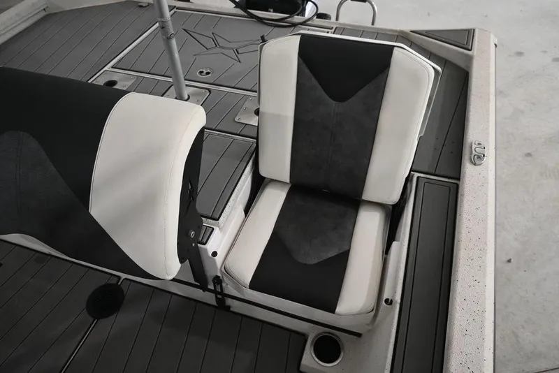 Slide: The Image of 2023 Vexus AVX2180CC boat interior with black and white seating. - 11