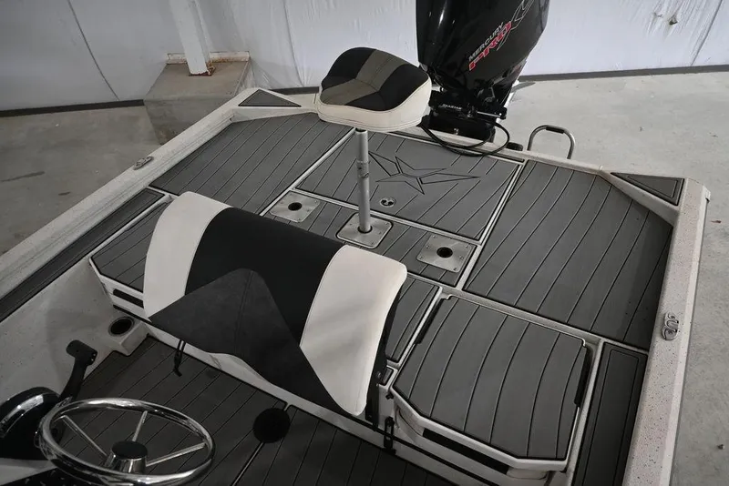 Slide: The Image of 2023 Vexus AVX2180CC boat interior with seating and steering wheel. - 8