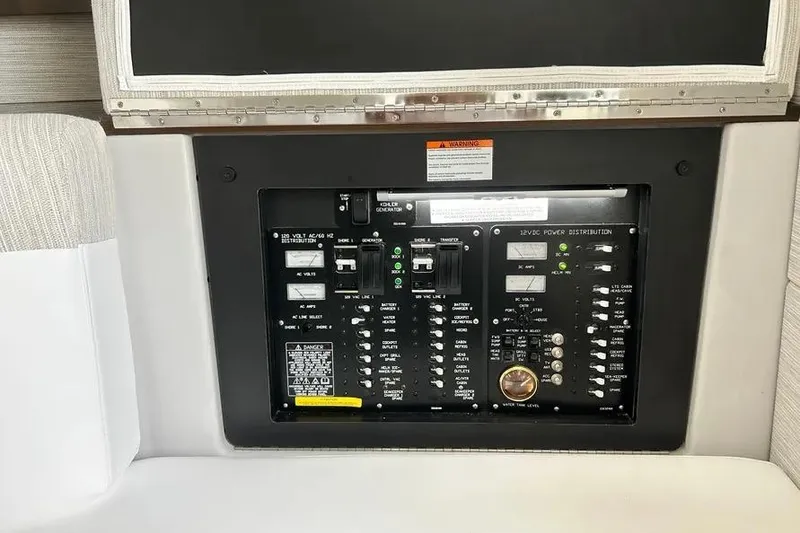 Slide: The Image of Electrical control panel on 2023 Cruisers Yachts 38 GLS OB boat interior. - 9