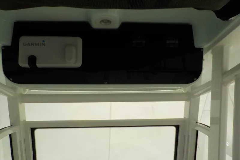 Slide: The Image of Interior view of 2022 Edgewater 230CC boat with Garmin equipment. - 3