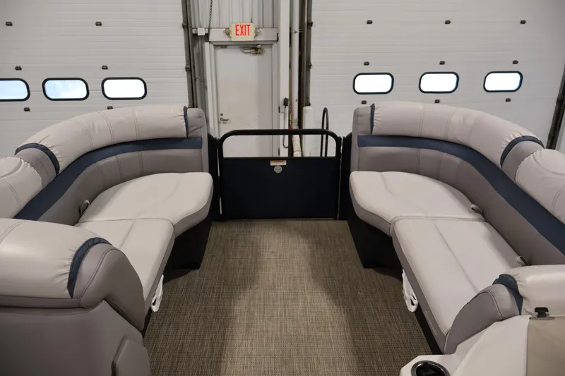 Slide: The Image of Interior of a 2018 Sweetwater 2186 pontoon boat with plush seating. - 11