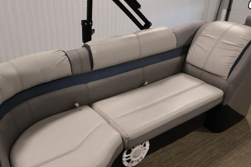 Slide: The Image of Luxurious seating on a 2018 Sweetwater 2186 boat, featuring plush gray upholstery. - 32