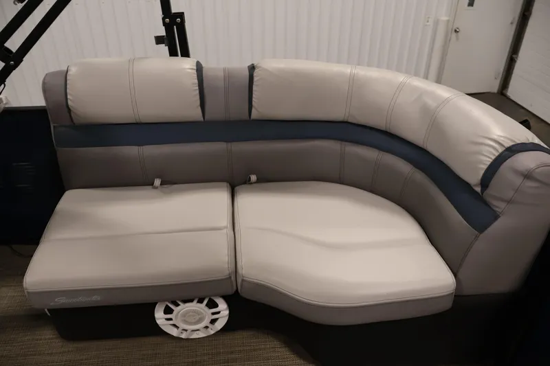 Slide: The Image of Luxurious Sweetwater 2186 boat seating, 2018 model, featuring plush gray and blue upholstery. - 34