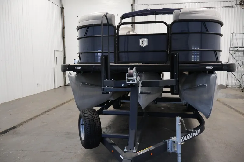 Slide: The Image of 2018 Sweetwater 2186 pontoon boat on trailer in indoor storage facility. - 44