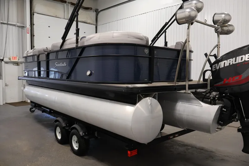 Slide: The Image of 2018 Sweetwater 2186 pontoon boat with Evinrude motor in indoor storage. - 7