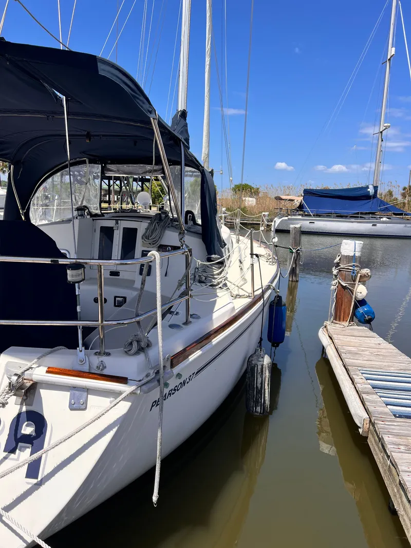 Slide: The Image of 1990 Pearson 37-2 sailboat docked in marina. - 16