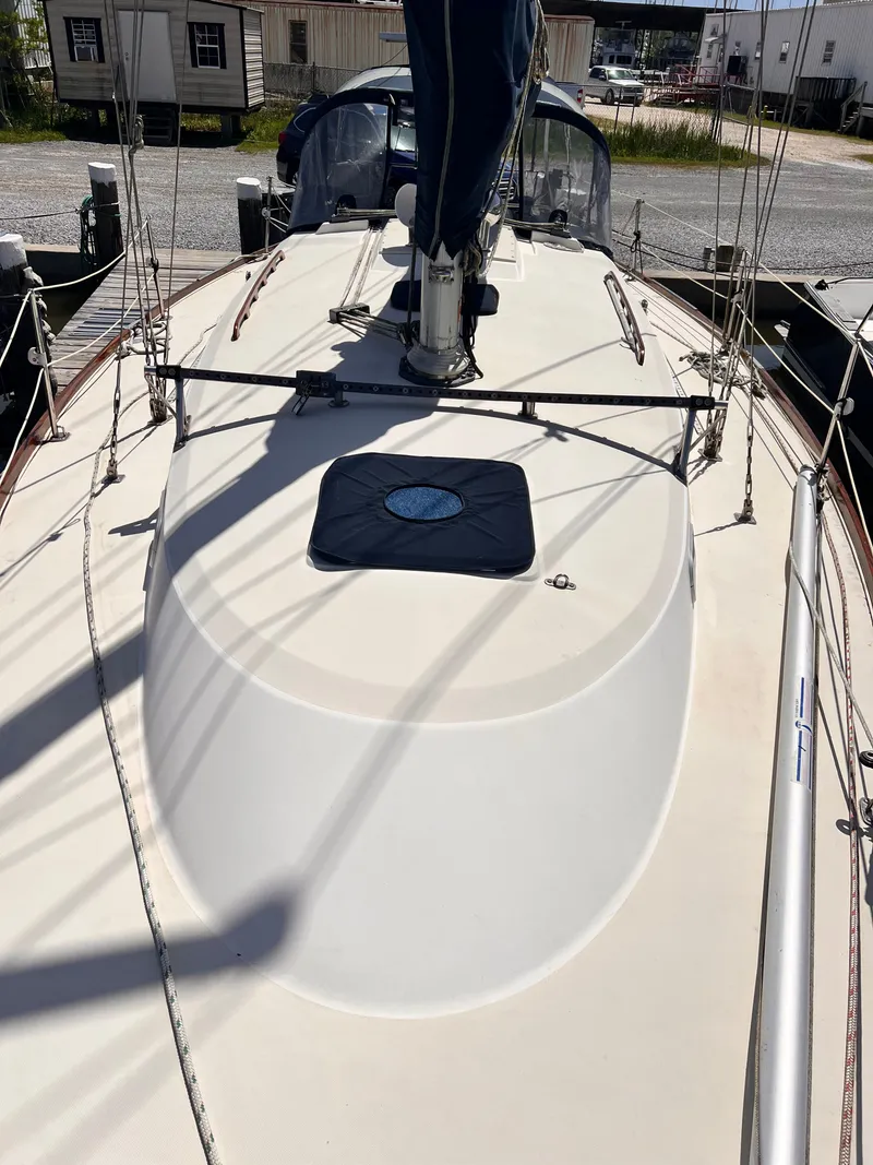 Slide: The Image of Deck of a 1990 Pearson 37-2 sailboat in harbor. - 18