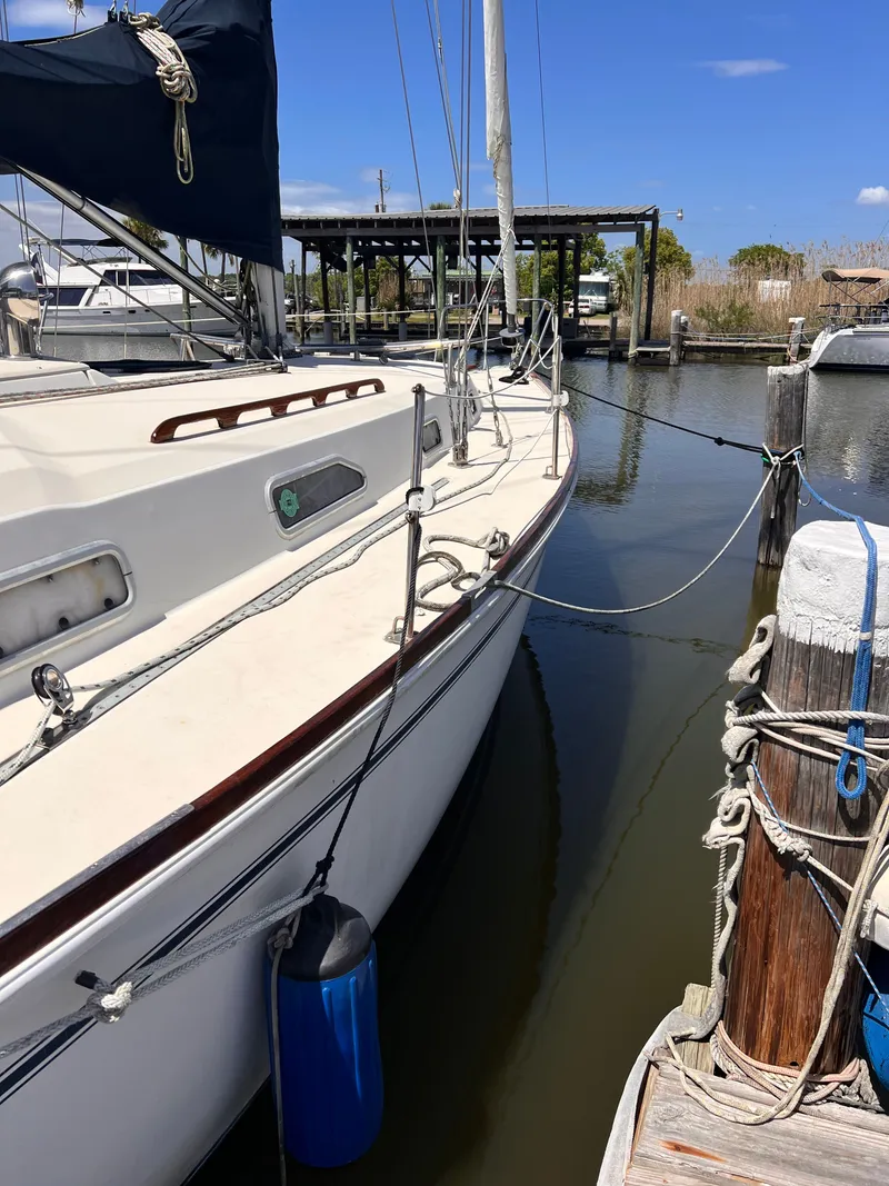Slide: The Image of 1990 Pearson 37-2 sailboat docked in marina. - 19