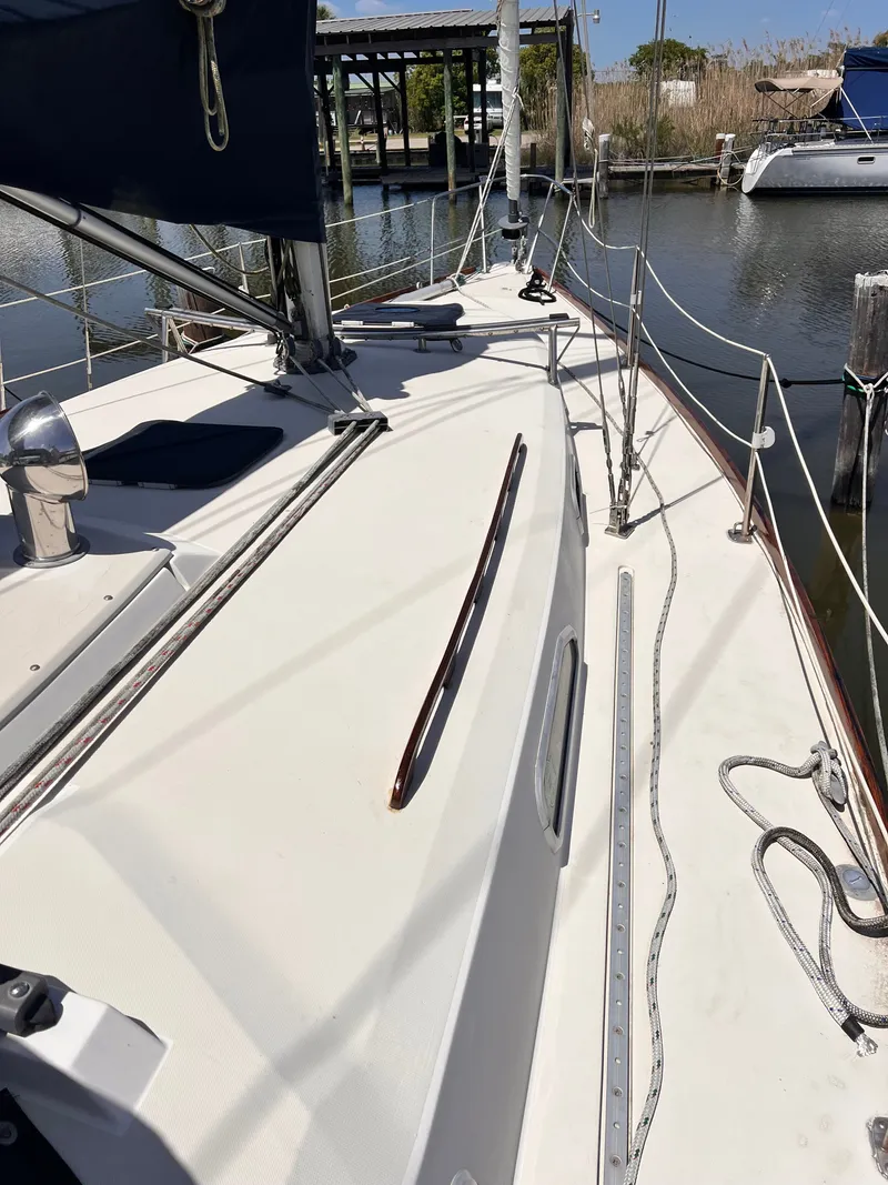 Slide: The Image of Deck of a 1990 Pearson 37-2 sailboat in harbor. - 20