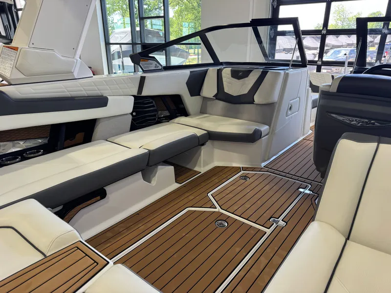 Slide: The Image of Interior of 2022 Nautique Super Air Nautique G23 with luxurious seating. - 14