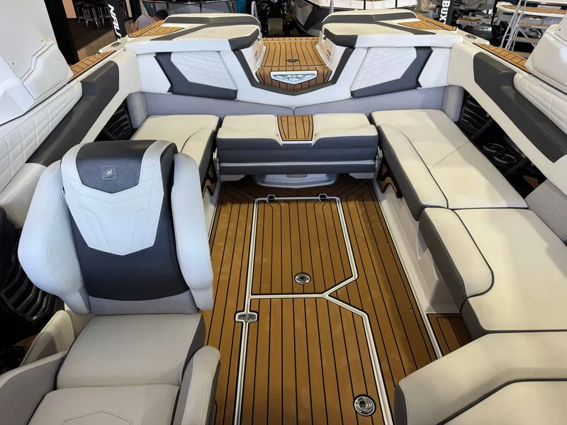 Slide: The Image of Interior of 2022 Nautique Super Air Nautique G23 with luxurious seating. - 22