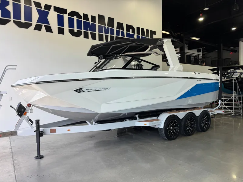 Slide: The Image of 2022 Nautique Super Air Nautique G23 boat in showroom. - 3