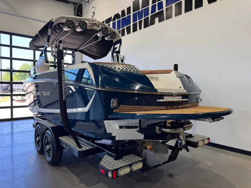 Slide: The Image of 2019 Nautique Super Air Nautique G25 boat in showroom. - 5