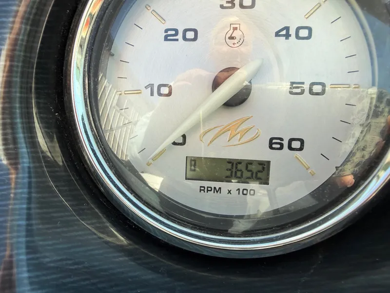 Slide: The Image of Tachometer of a 2012 Monterey 264FS boat, displaying 3652 RPM. - 15