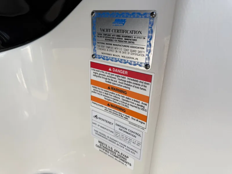 Slide: The Image of Yacht certification and warning labels on 2012 Monterey 264FS. - 17