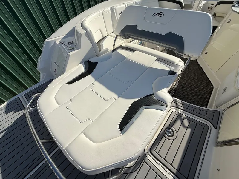 Slide: The Image of 2012 Monterey 264FS boat with luxurious lounge seating. - 29