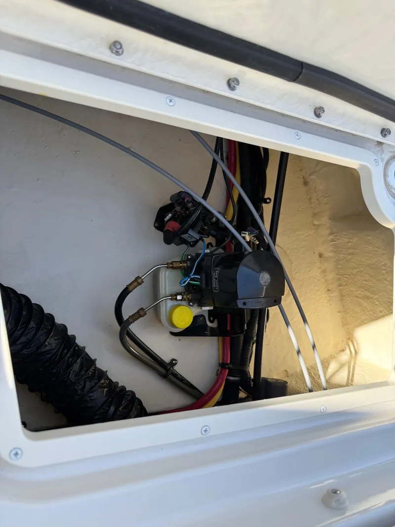 Slide: The Image of Interior view of a 2012 Monterey 264FS boat engine. - 33