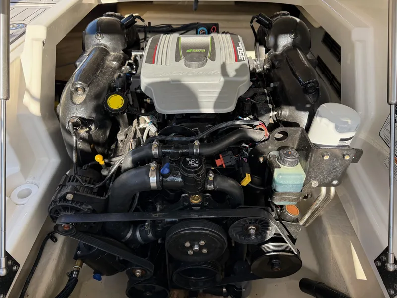 Slide: The Image of Engine compartment of a 2012 Monterey 264FS boat, clean and well-maintained. - 34