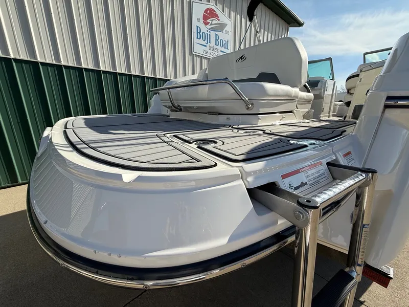 Slide: The Image of 2012 Monterey 264FS boat with swim platform and ladder. - 5