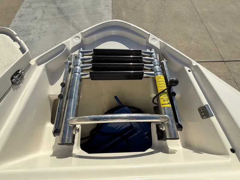 Slide: The Image of Monterey 264FS 2012 boat with folded ladder. - 9