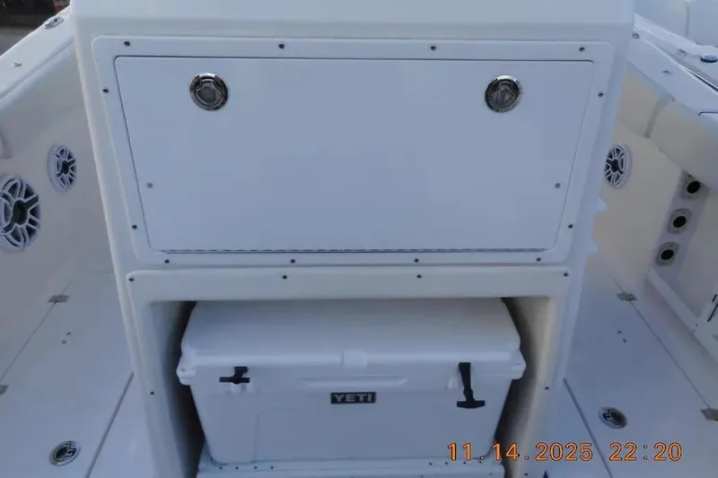 Slide: The Image of 2026 Sea Fox 288 Commander boat interior with Yeti cooler storage. - 12