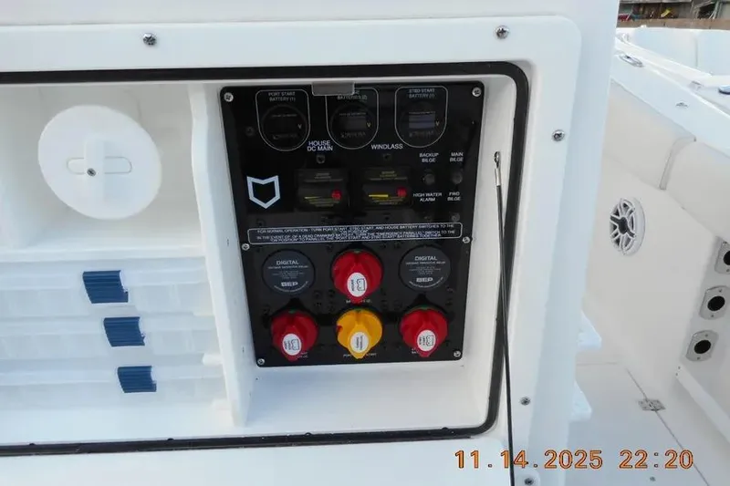 Slide: The Image of Electrical panel on a 2026 Sea Fox 288 Commander boat, featuring various switches and controls. - 13