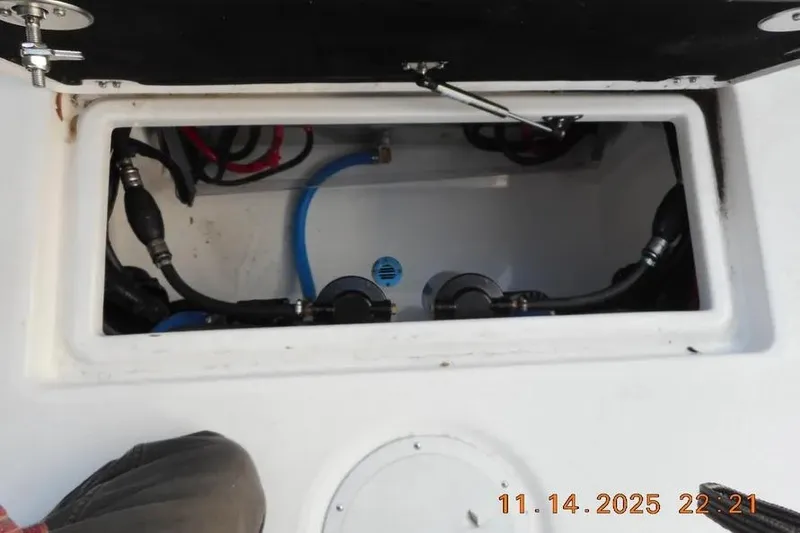 Slide: The Image of Open hatch of 2026 Sea Fox 288 Commander showing internal wiring and components. - 16