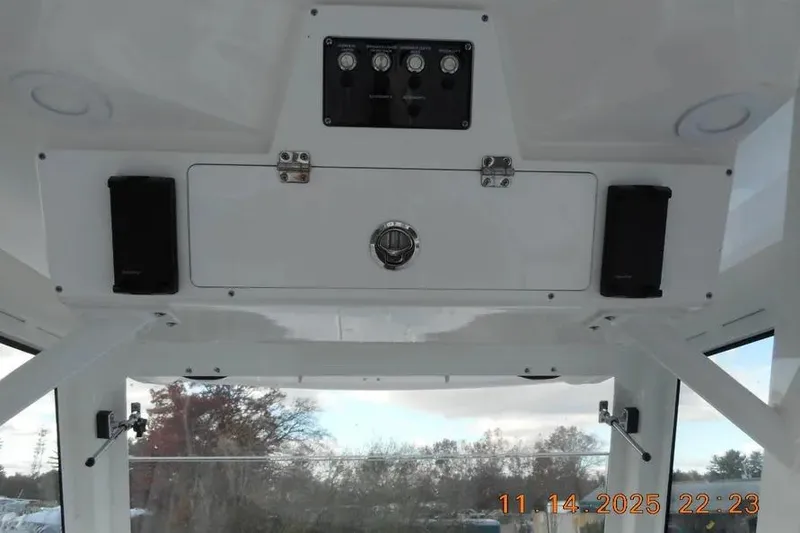 Slide: The Image of Interior view of 2026 Sea Fox 288 Commander boat's control panel and speakers. - 20