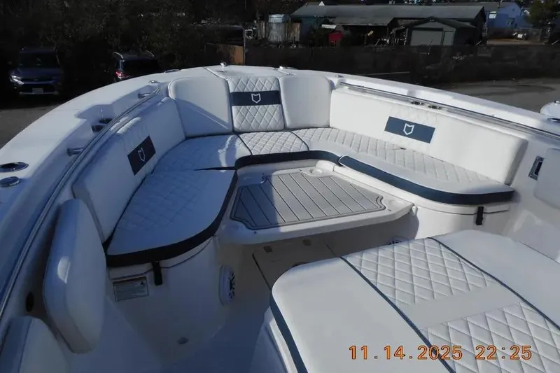 Slide: The Image of 2026 Sea Fox 288 Commander boat with spacious, cushioned seating area. - 21