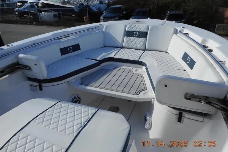 Slide: The Image of 2026 Sea Fox 288 Commander boat interior with cushioned seating and sleek design. - 22