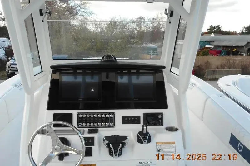 Slide: The Image of Helm of 2026 Sea Fox 288 Commander boat with advanced navigation controls. - 5
