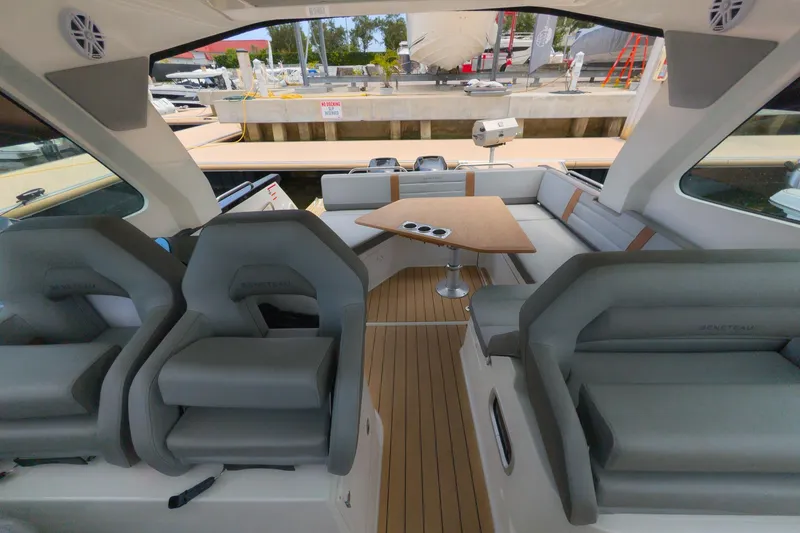 Slide: The Image of Interior of 2023 Beneteau Gran Turismo 32 yacht with seating and table. - 23