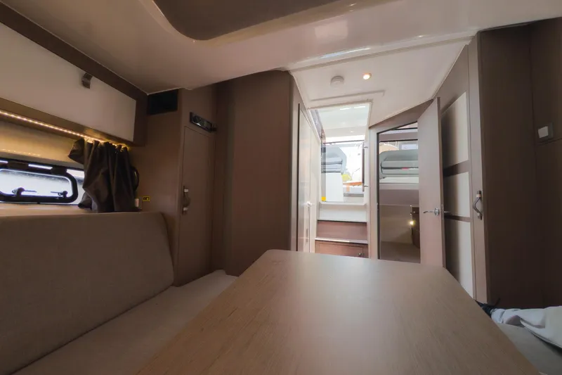 Slide: The Image of Interior of 2023 Beneteau Gran Turismo 32 yacht, featuring modern design and cozy seating area. - 34