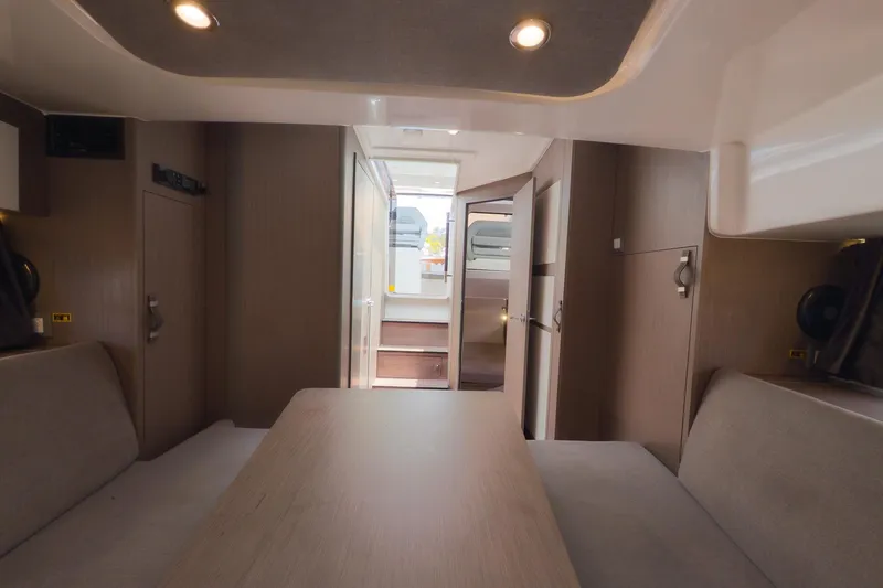 Slide: The Image of Interior of 2023 Beneteau Gran Turismo 32 yacht, featuring modern design and comfortable seating. - 35