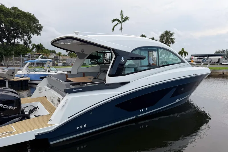 Slide: The Image of 2023 Beneteau Gran Turismo 32 yacht docked, showcasing sleek design and modern features. - 42