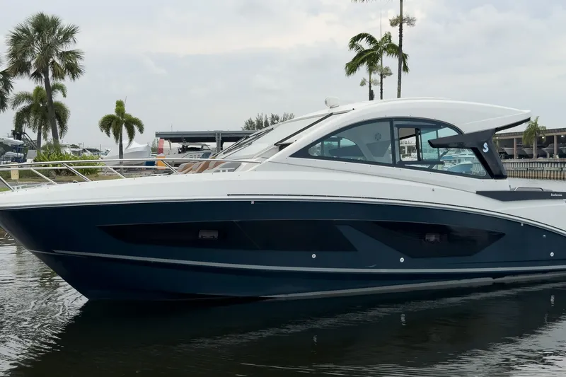 Slide: The Image of 2023 Beneteau Gran Turismo 32 yacht docked, featuring sleek design and modern aesthetics. - 54