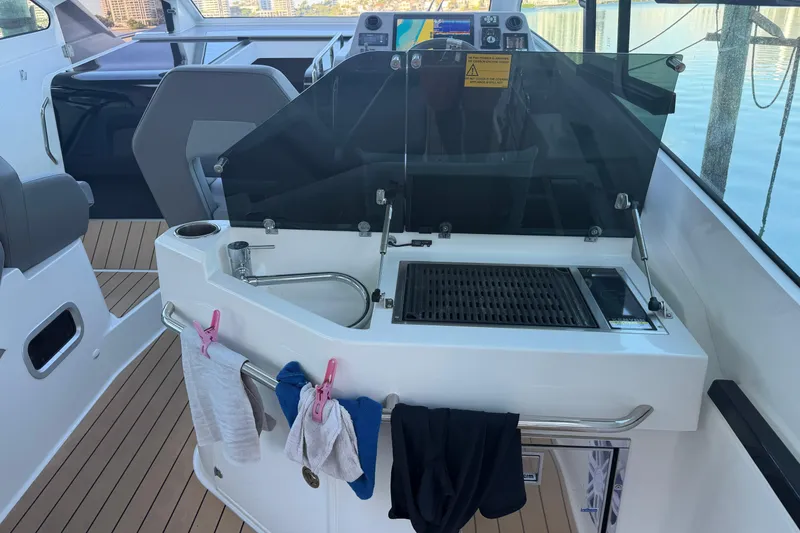 Slide: The Image of Outdoor kitchen on 2023 Beneteau Gran Turismo 32 yacht with grill and sink. - 7