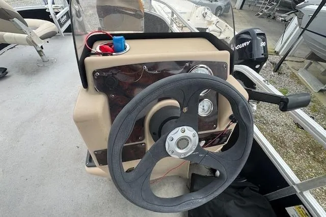 Slide: The Image of Steering console of a 2016 Sun Tracker Bass Buggy 18 DLX pontoon boat. - 10