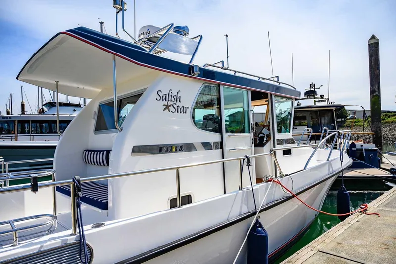 Slide: The Image of 2019 Nord Star 28 Patrol boat docked, featuring sleek design and modern amenities. - 10